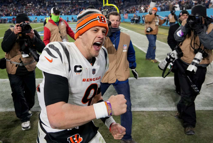 Jan 22, 2022; Nashville, Tennessee, USA; Cincinnati Bengals quarterback Joe Burrow (9) celebrates after defeating the Tennessee Titans 19-16 during the AFC Divisional playoff football game at Nissan Stadium. Mandatory Credit: Kirby Lee-USA TODAY Sports